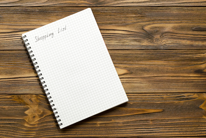 Preparing the shopping list before going to buy the groceries